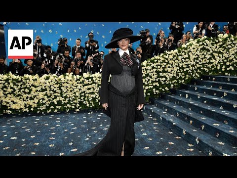 Rihanna debuts new baby bump at Met Gala 2025